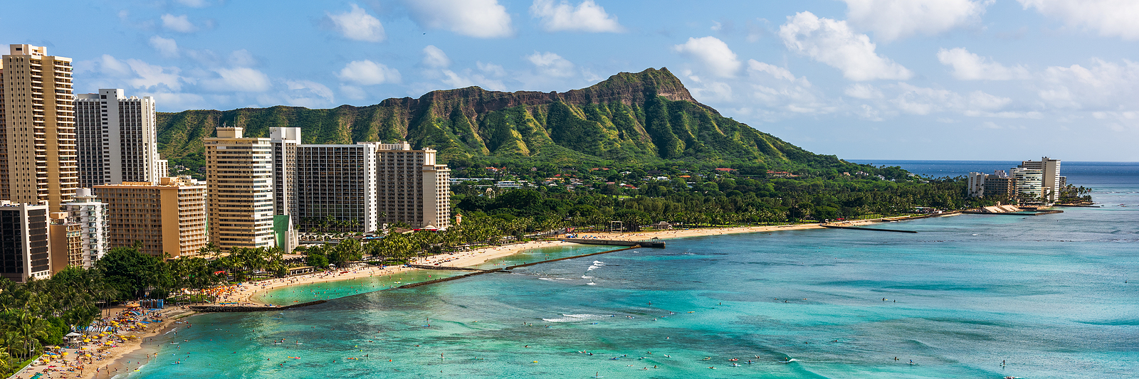 Coastal city with beach and mountains
